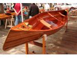 An exquisite wooden kayak in the shoreside exhibition.